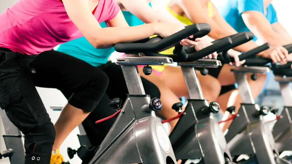 picture shows many gym users on gym bikes which have been refurbished
